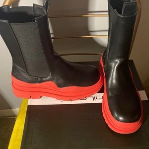 Red and black combat style boot